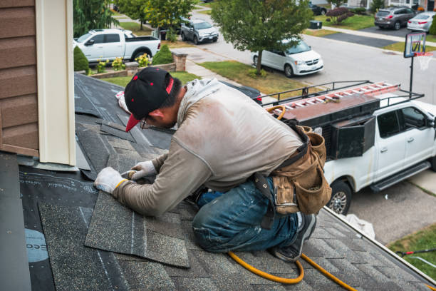 Professional Roof Replacement technician working in Lisle, NY